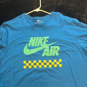 Nike Air Blue Tee with Green Logo and Yellow Checkered Pattern